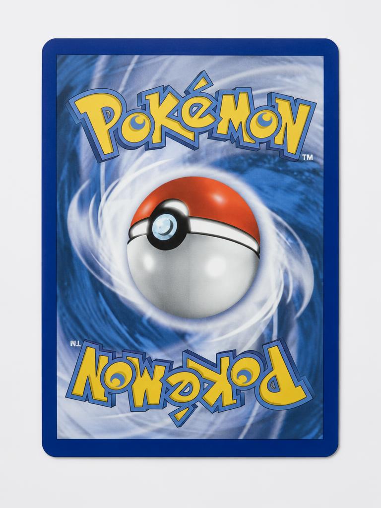 Pokémon card backs stacked